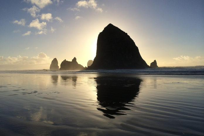 Haystack Rock is a 235-foot (72-meter) sea stack in Cannon Beach