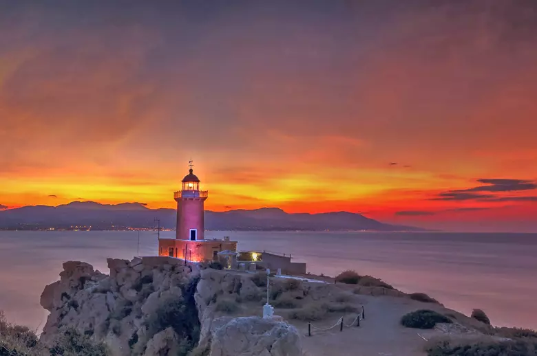 The lighthouse at Acre Melagavi or Lighthouse of Iraion is  one of the most photographed landmarks