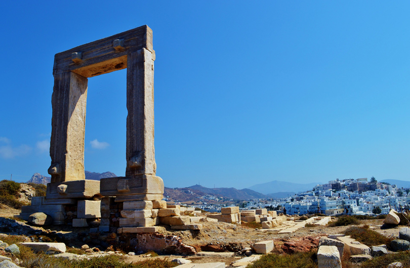 The Portara of Naxos or Naxos Temple Gate called fragment of the Temple of Apollo on Naxos, an island of the Cyclades, is considered the landmark of Naxos. The gate is located on a peninsula in front of the city of Naxos.