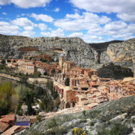 One of the most picturesque towns of Spain with a well-preserved medieval fortress wall, Albarracin was named in honor of the Moorish rulers from the Al-Banu-Racin clan