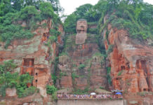 The Leshan Giant Buddha is the world's largest stone sculpture of a seated Buddha,It was carved out of a rock at the confluence of the Min Jiang, Dadu, and Qingyi Rivers near the city of Leshan, in the southern part of Sichuan Province, China.