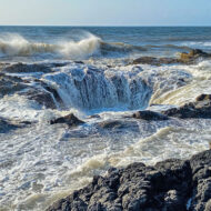 This natural attraction is known as Thor's Well and is located near Spouting Horn