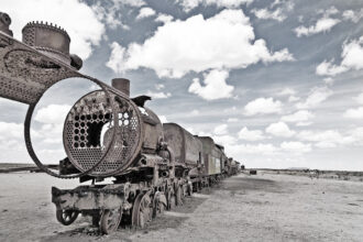 The Train Cemetery is a site of abandoned trains on the edge of the Salar de Uyuni salt flats in Bolivia.