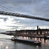 The Vizcaya Bridge is a flying ferry across the Nervión River that connects the cities of Portugalete and Las Arenas (part of Getxo) in the province of Vizcaya, Spain.