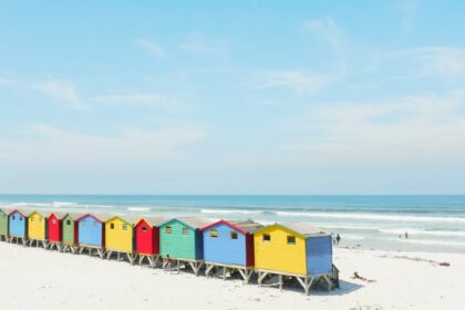 Muizenberg Beach is a beach at the seaside suburb known as Muizenberg , along the False Bay coastline, in the western part of Cape Town, in South Africa.
