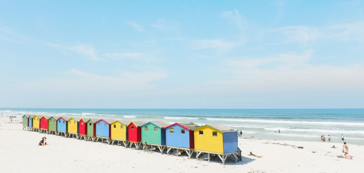 Muizenberg Beach is a beach at the seaside suburb known as Muizenberg , along the False Bay coastline, in the western part of Cape Town, in South Africa.