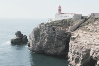 The Cabo de São Vicente lighthouse is located at Cabo de São Vicente in the Algarve near Sagres in Portugal.