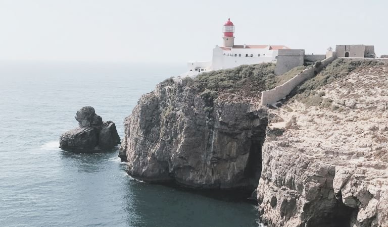 The Cabo de São Vicente lighthouse is located at Cabo de São Vicente in the Algarve near Sagres in Portugal.