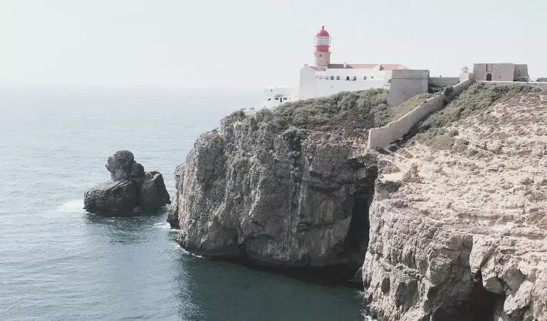 The Cabo de São Vicente lighthouse is located at Cabo de São Vicente in the Algarve near Sagres in Portugal.