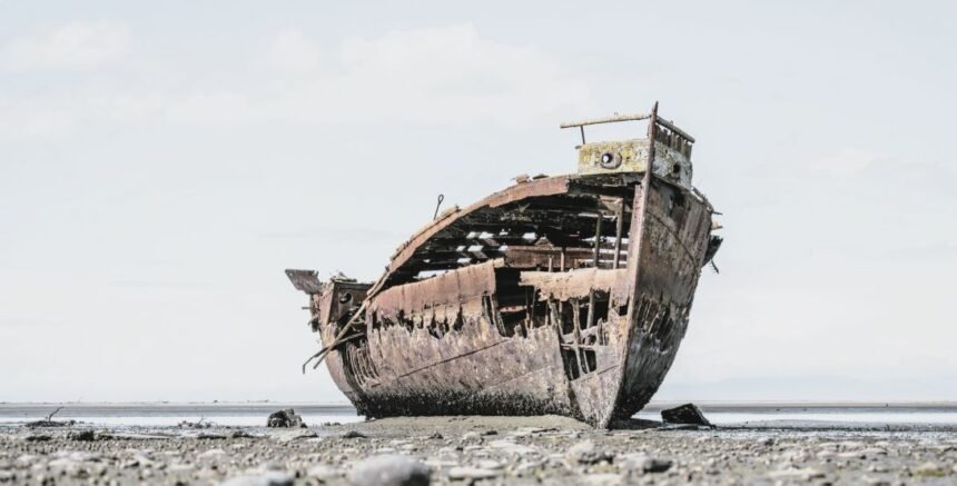 The rusted remains of the Janie Seddon shipwreck located on the Motueka foreshore, Nelson Tasman, New Zealand.