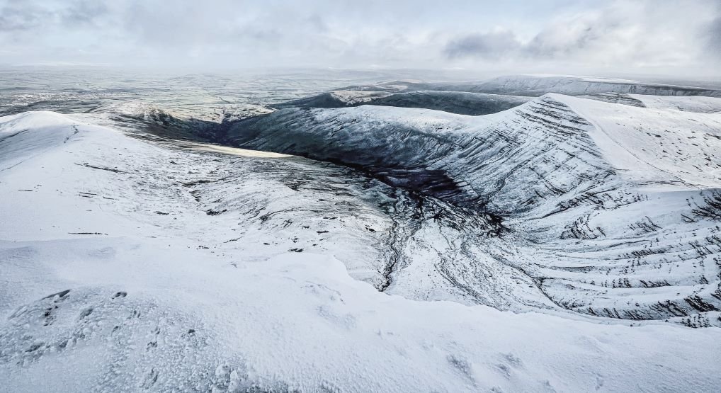 Pen y Wan is the highest peak in South Wales , situated in Brecon Beacons National Park , United Kingdom.