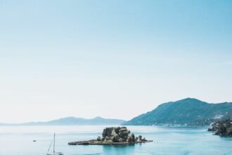 Pontikonisi is a tiny rocky islet in the Ionian Sea. It is one of the Ionian Islands and is located just a few meters east of Corfu.
