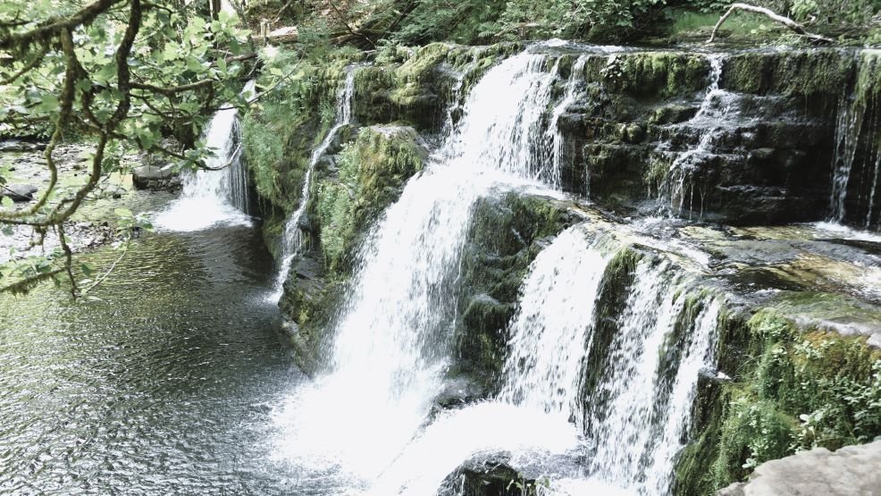 The Sgwd yr Eira waterfall, located in the Brecon Beacons National Park in South Wales, United Kingdom.