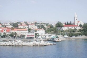 Sumartin is a coastal village on the east of the island of Brač , a Croatian island in the Adriatic Sea.