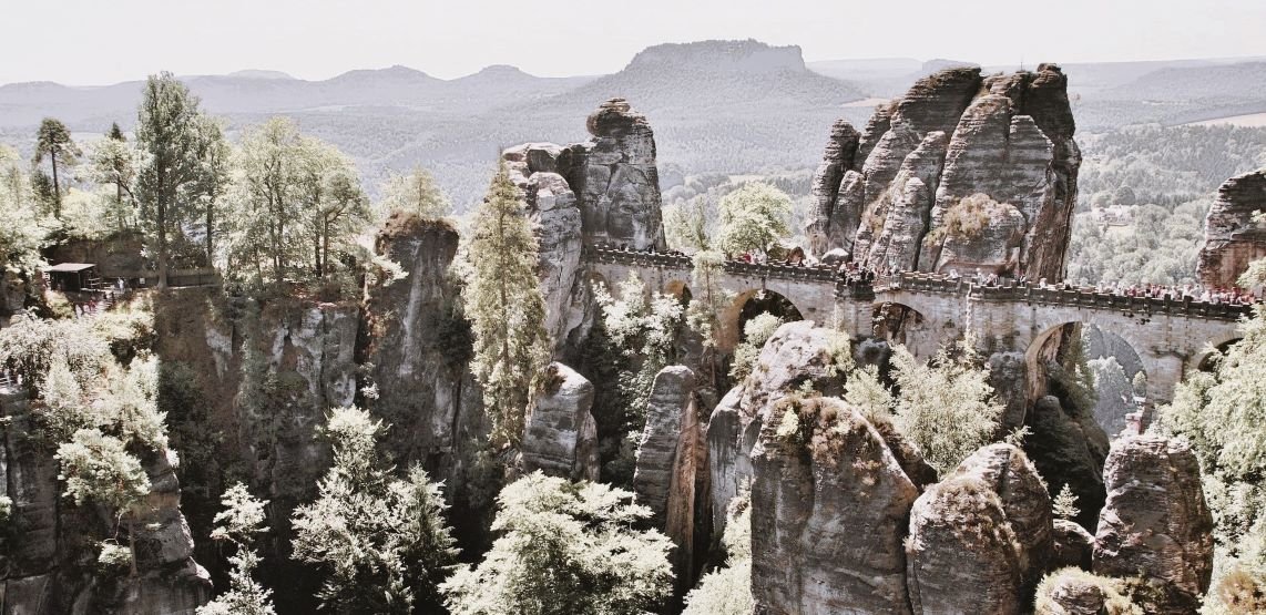 Bastei is a famous rock formation with an observation deck in the Elbe Sandstone Mountains in Saxon Switzerland , Germany.