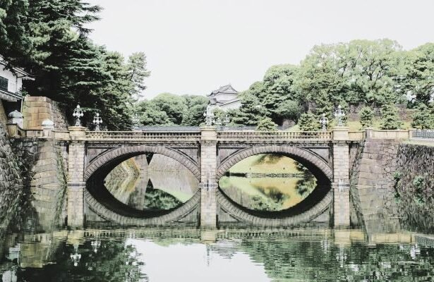 Nijubashi Bridge located in front of the main entrance of the Imperial Palace , the main residence of the Emperor of Japan.