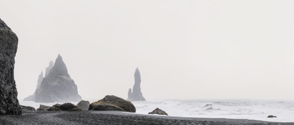 Reynisdrangar or Troll's Fingers is a set of basalt stacks located near the village Vík í Mýrdal, in southern Iceland.